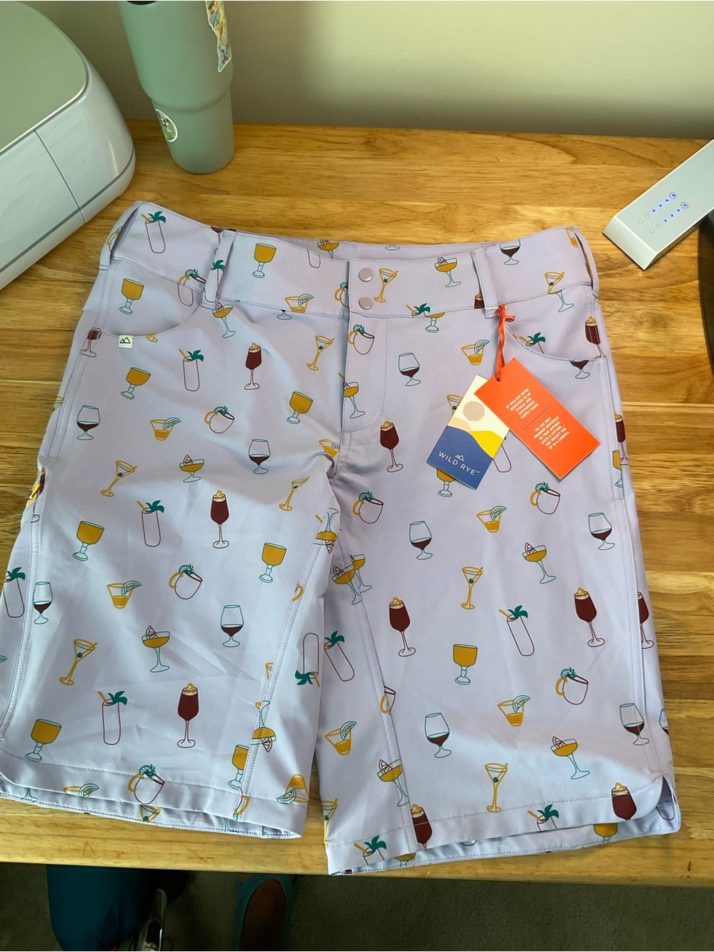 Wild Rye Light Lavender, teal & orange shorts. Cycling or in town, cool shorts